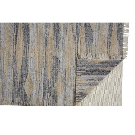 5' X 8' Gray Tan And Silver Abstract Hand Woven Stain Resistant Area Rug With Fringe