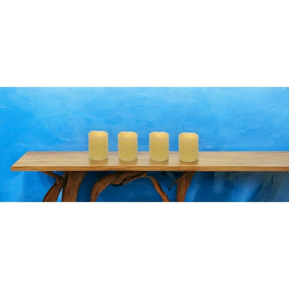 HomeRoots Set Of Four Yellow Flameless Pillar Candle