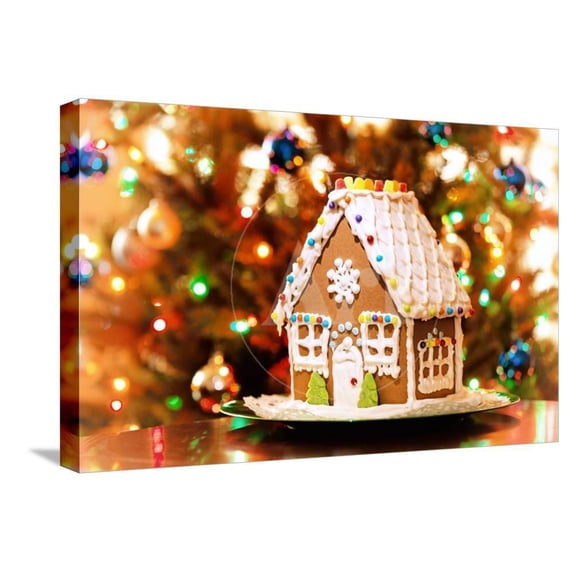 Homemade Christmas Gingerbread House Displayed on a Table Christmas Tree Lights in the Background, Stretched Canvas Wall Art by Leena Robinson Sold by ArtCom