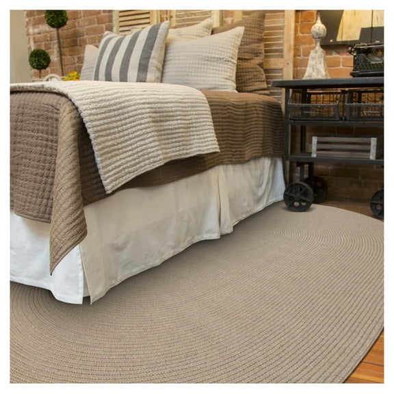 Homespice - Biscuit Braided Area Rug, a Natural-Looking Solid Beige Area Rug to Use as Farmhouse Rugs for Living Room and Patio - Absorbs Liquid and Stains - Oval UV Treated Neutral Rug 6x9' Feet