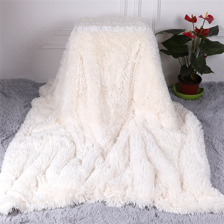 Furry fabric fleece comfy crumpled bedroom blanket Stock Photo by ©golubovy  215636266