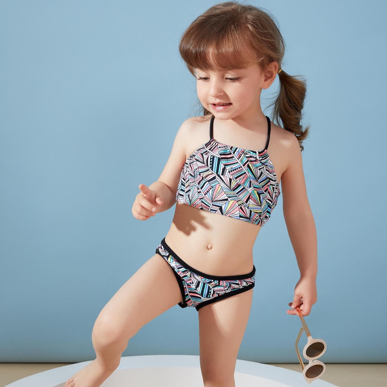 Child modeling bathing suits sales