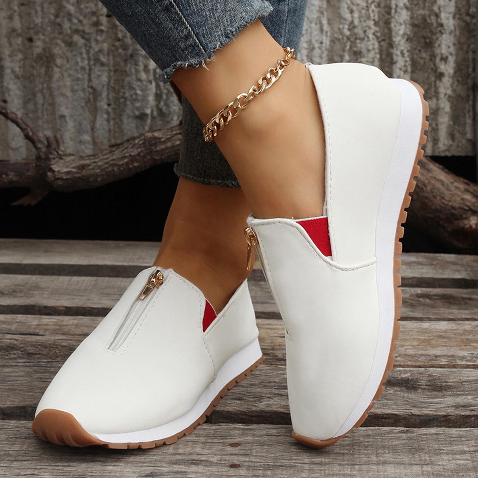 white slip on trainers women's