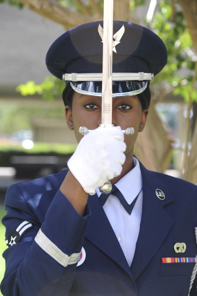Honor Guard places a saber in front of her face Canvas Art - Stocktrek Images (23 x 35)
