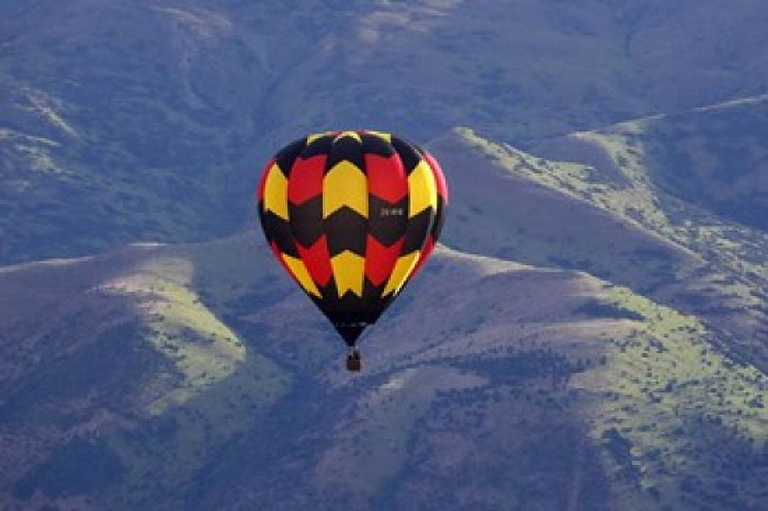 Hot Air Balloon and Mountains South Island New Zealand Canvas Art - David Wall DanitaDelimont (35 x 24)