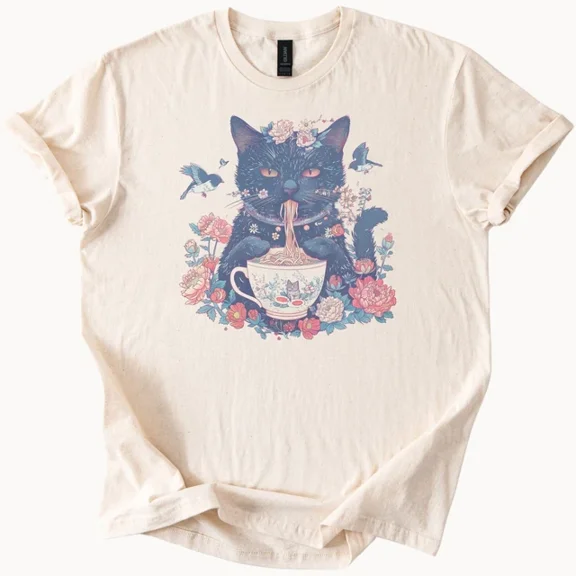 Hot Trending Cat Eating Ramen in Teacup Surrounded by Flowers and Birds Graphic Tee Design Preview Only