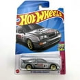 thumbnail image 1 of Hot Wheels '87 Ford Sierra Cosworth Silver HW: The '80s 1/10 2/250, 1 of 3