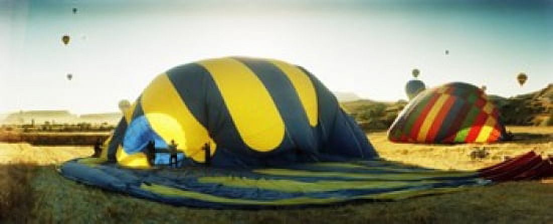 Hot air balloon being deflated Cappadocia Central Anatolia Region Turkey Canvas Art - Panoramic Images (30 x 12)