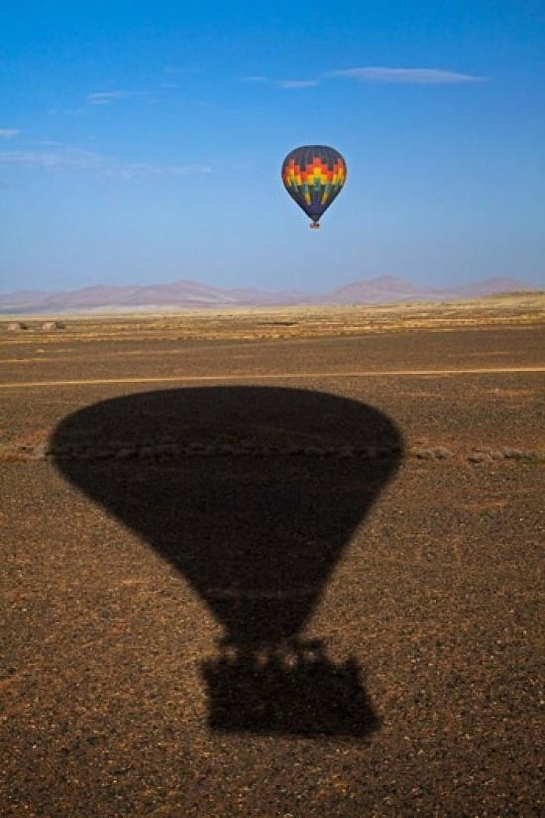 Hot air balloon casting a shadow over Namib Desert Sesriem Namibia ...