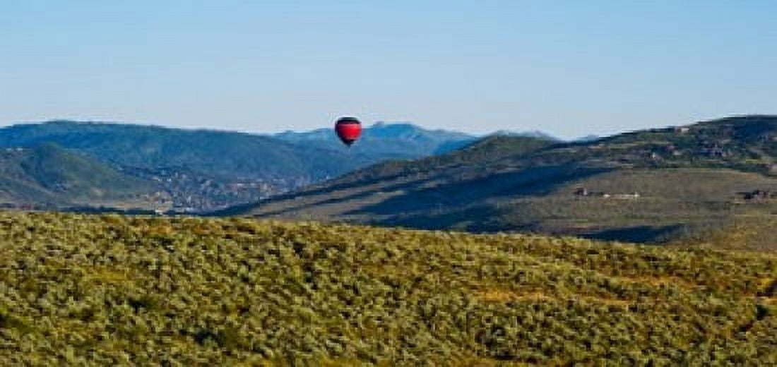 Hot air balloon flying in a valley Park City Utah USA Canvas Art - Panoramic Images (24 x 12)