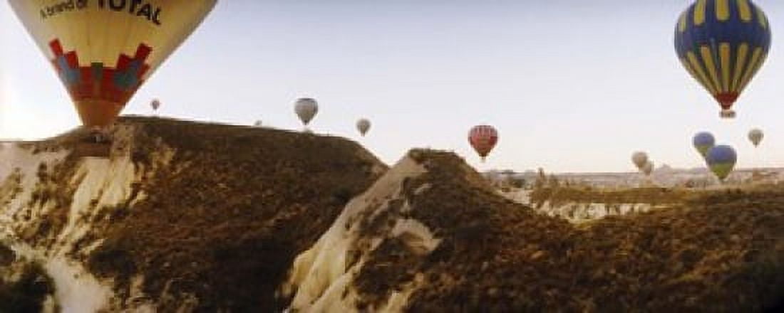 Hot air balloons over landscape at sunrise Cappadocia Central Anatolia Region Turkey Canvas Art - Panoramic Images (15 x 6)