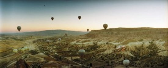 Hot air balloons over landscape at sunrise Cappadocia Central Anatolia Region Turkey Canvas Art - Panoramic Images (30 x 12)