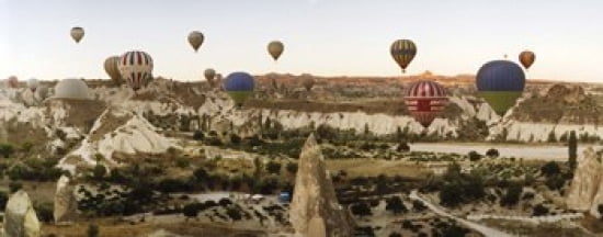Hot air balloons over landscape at sunrise Cappadocia Central Anatolia Region Turkey Canvas Art - Panoramic Images (30 x 12)