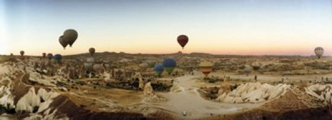 Hot air balloons over landscape at sunrise Cappadocia Central Anatolia Region Turkey Canvas Art - Panoramic Images (36 x 13)