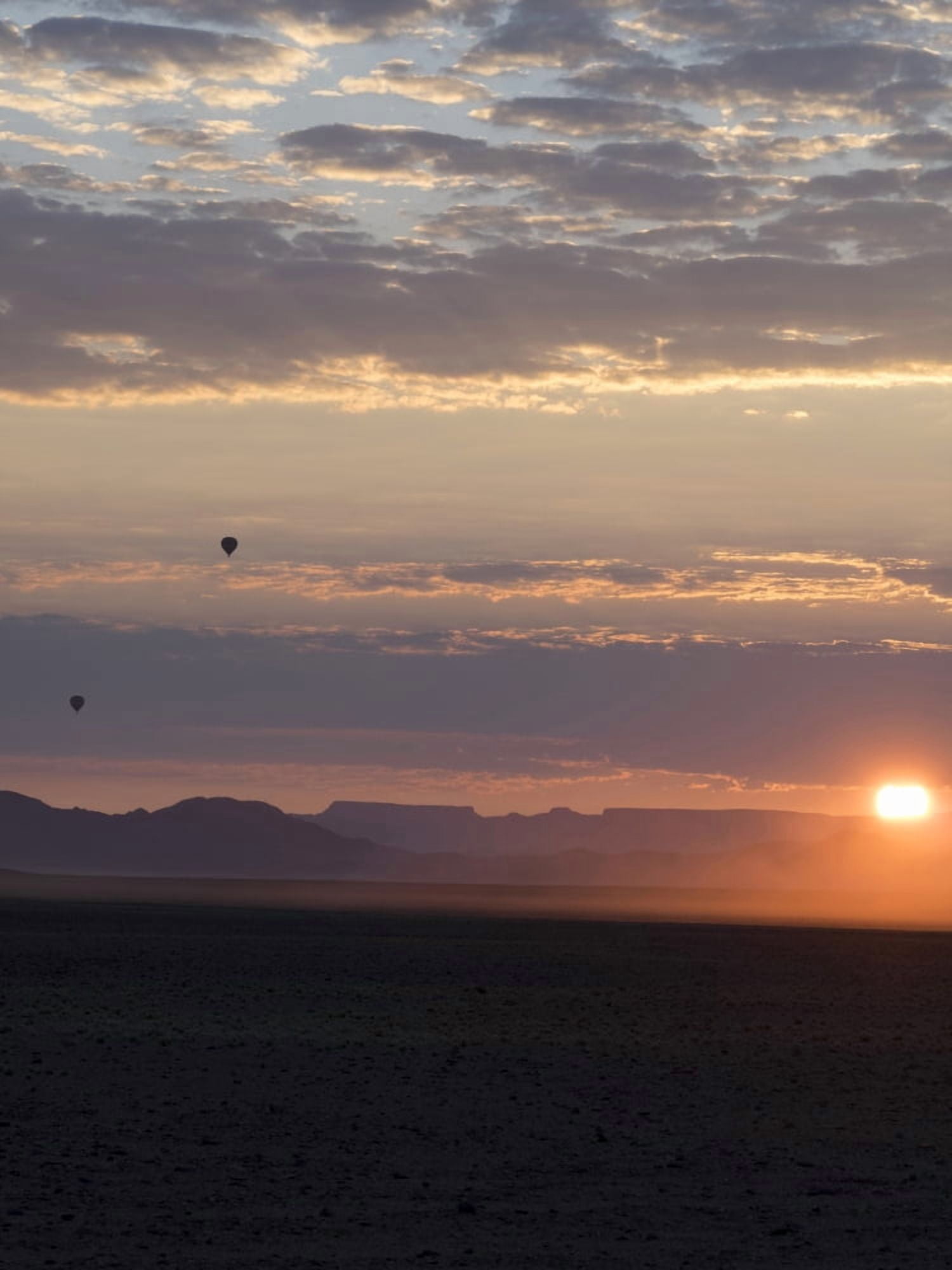Hot air balloons rising above desert at dusk Namib-Naukluft National Park Hardap Namibia Canvas Art - Panoramic Images (12 x 16)