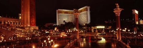 Hotel lit up at night The Mirage The Strip Las Vegas Nevada USA Canvas Art - Panoramic Images (36 x 12)