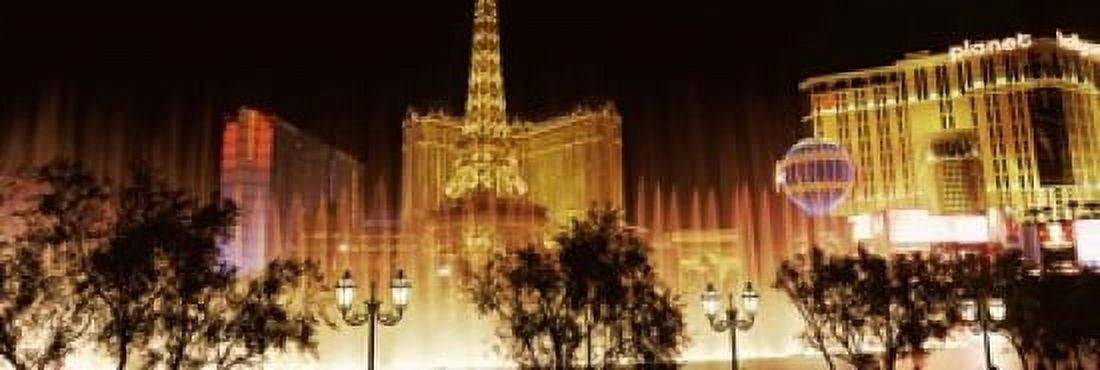 Hotels in a city lit up at night The Strip Las Vegas Nevada USA Canvas Art - Panoramic Images (18 x 6)