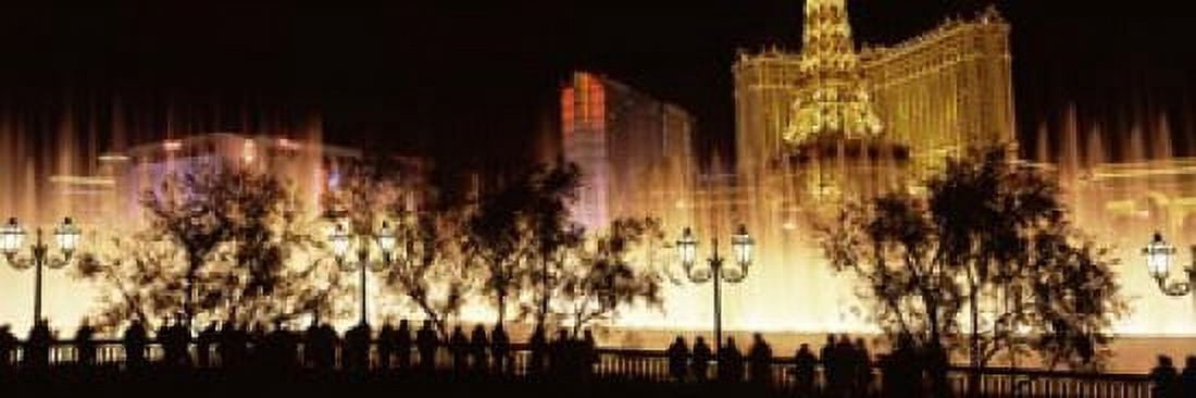 Hotels in a city lit up at night The Strip Las Vegas Nevada USA Canvas Art - Panoramic Images (18 x 6)