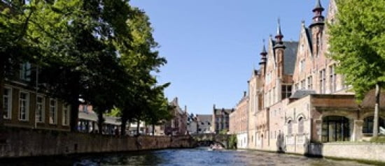 Houses along a canal Bruges West Flanders Belgium Canvas Art - Panoramic Images (30 x 13)