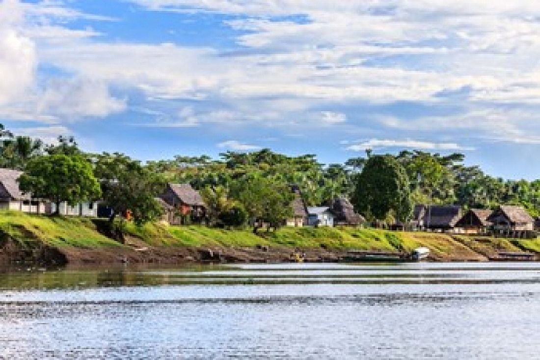 Houses along a riverbank in the Amazon basin Peru Canvas Art - Tom Norring DanitaDelimont (25 x 17)