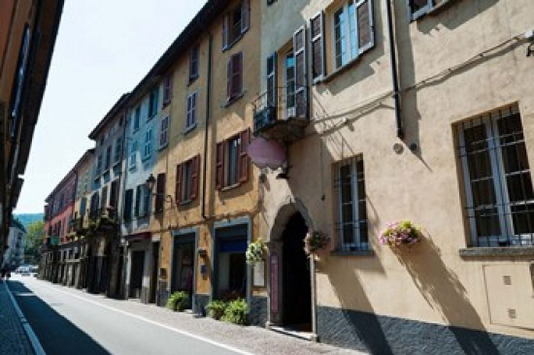 Houses along a street Cernobbio Como Lombardy Italy Canvas Art - Panoramic Images (36 x 24)
