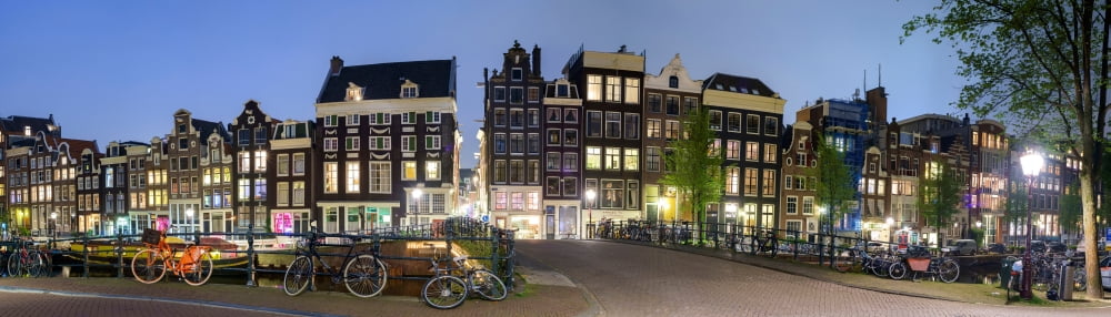Houses along the Singel at Blauwburgwal Amsterdam North Holland Netherlands Canvas Art - Panoramic Images (36 x 12)