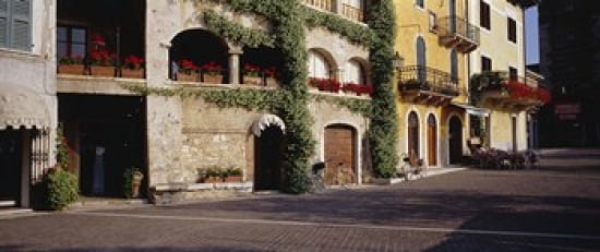 Houses at a road side Torri Del Benaco Italy Canvas Art - Panoramic Images (30 x 13)