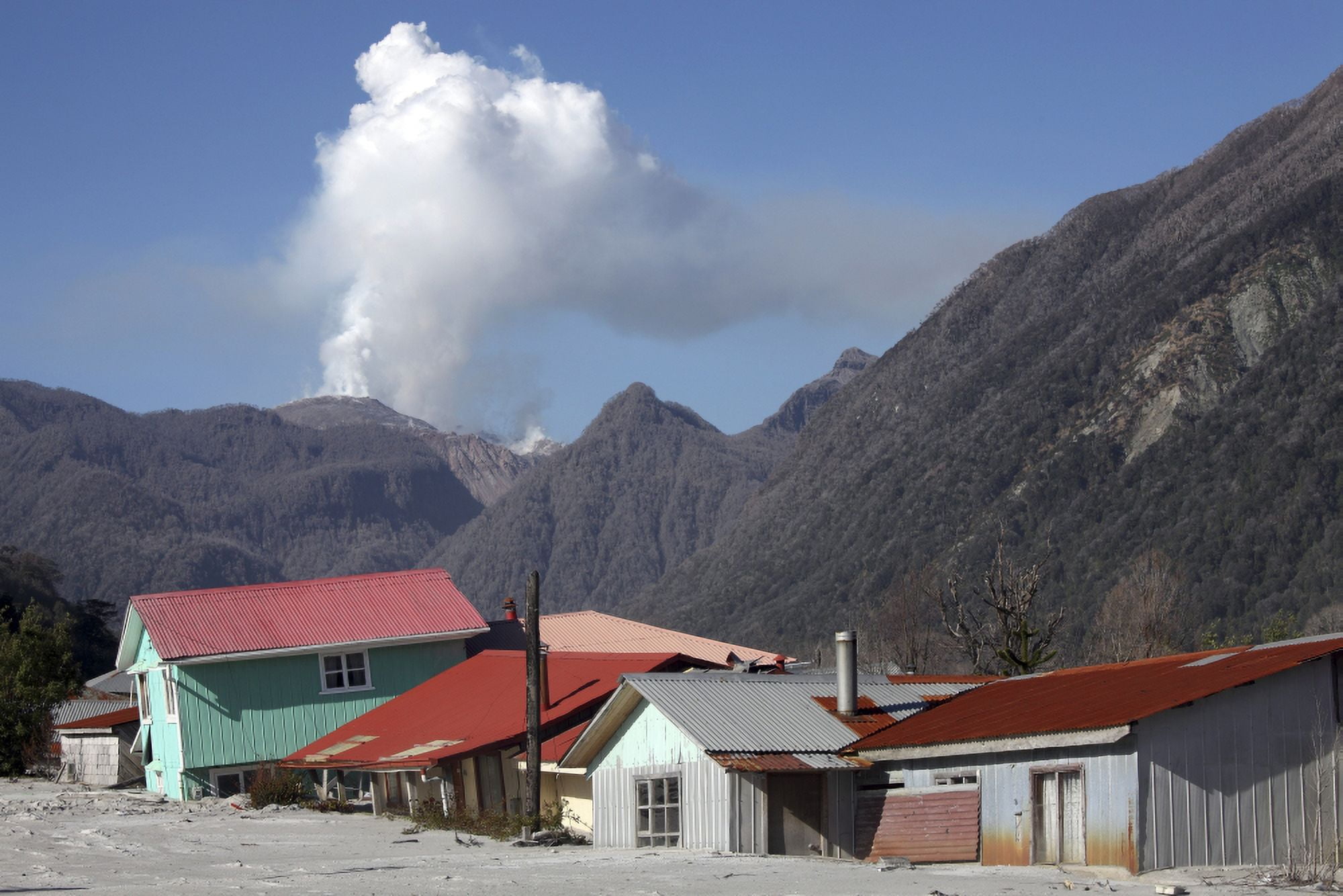 Houses buried in Lahar deposits in the town of Chaiten Chile Canvas Art - Richard RoscoeStocktrek Images (35 x 24)