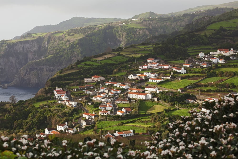 Houses on a hillside Ribeira dos Barqueiros Flores Island Azores Portugal Canvas Art - Carl Bruemmer Design Pics (38 x 24)