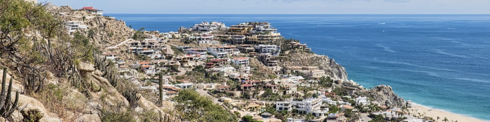 Houses on the coast Cabo San Lucas Mexico Canvas Art - Panoramic Images (48 x 12)