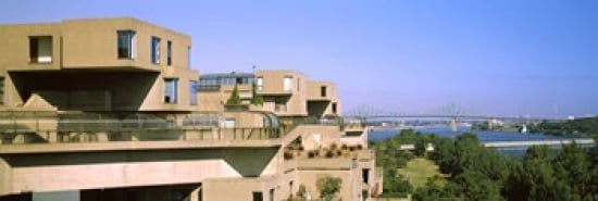Housing complex with a bridge in the background Habitat 67 Jacques Cartier Bridge Montreal Quebec Canada Canvas Art - Panoramic Images (36 x 12)