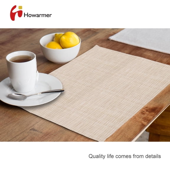 Howarmer Woven Placemats for Dining Table, Wipe Clean Vinyl Placemats Table Pad, Heat Resistant Anti-Slip Table Mats for Dining Room Kitchen Table Decor, PVC Placemats Set of 4, Beige