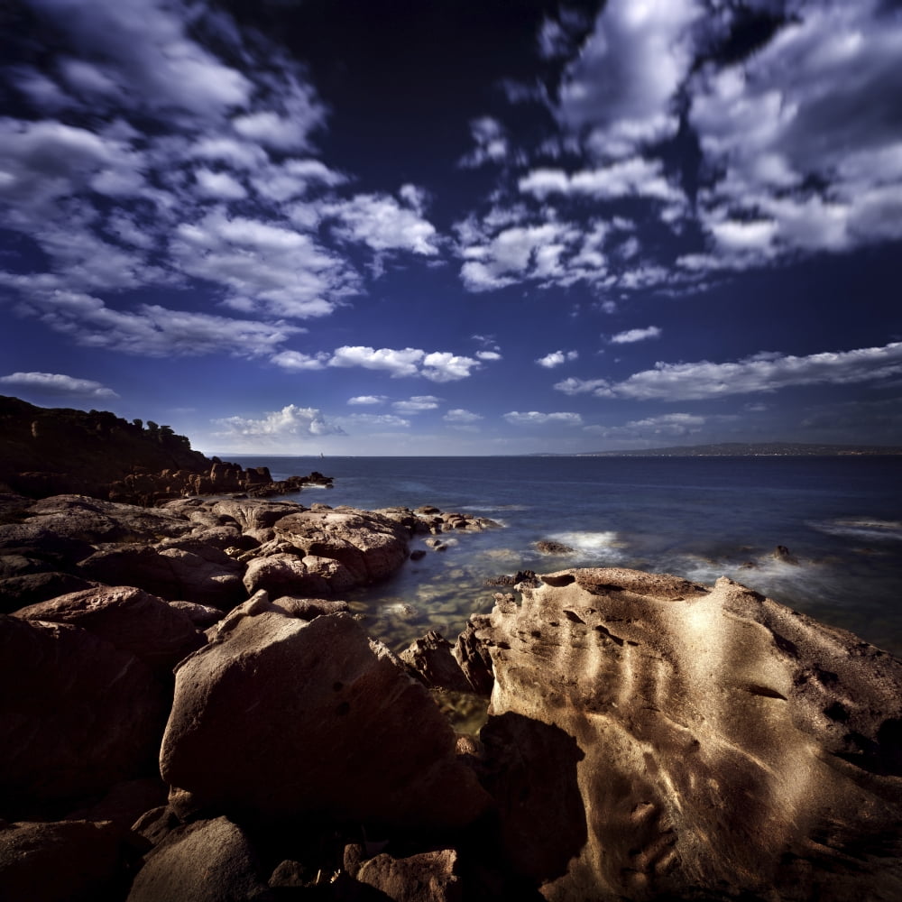 Huge rocks on the shore of a sea against cloudy sky Sardinia Italy Canvas Art - Evgeny KuklevStocktrek Images (29 x 29)