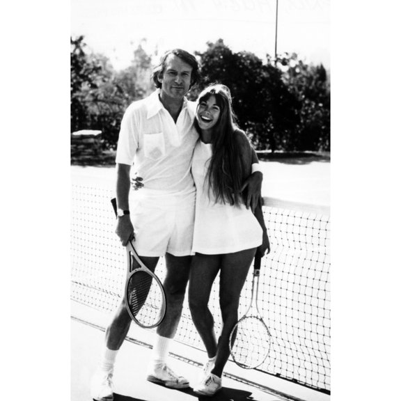 Hugh Hefner And Barbi Benton Pose For A Cover Shot For 'Tennis Magazine'. Ca 1972. Courtesy Csu ArchivesEverett
