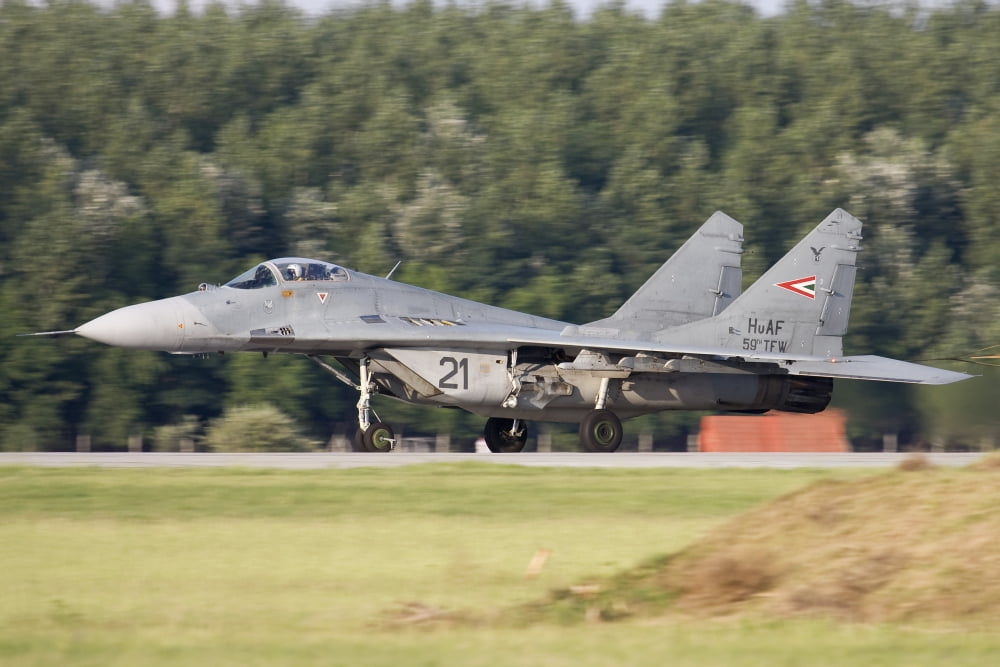 Hungarian Air Force MiG-29A landing on the runway Canvas Art - Anton BalakchievStocktrek Images (18 x 12)