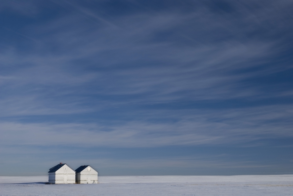 Hussar Alberta Canada Two Small Farm Buildings In Flat Winter Landscape Canvas Art - Philippe Widling Design Pics (17 x 11)