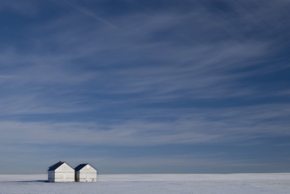 Hussar Alberta Canada Two Small Farm Buildings In Flat Winter Landscape Canvas Art - Philippe Widling Design Pics (34 x 22)