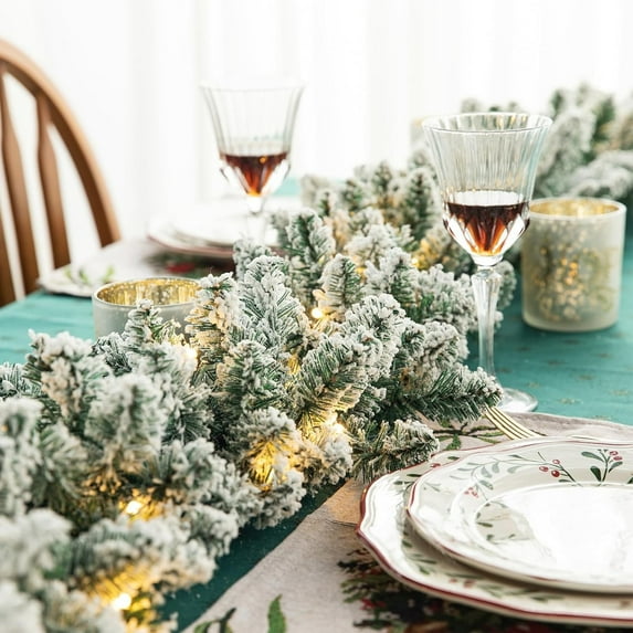 Hvmvliv Christmas Garland With Lights 9ft Christmas Flocked Pines and Holly Decorative Vines Realistic Snow-Finish Artificial Garland for Banisters Mantels Doorways and Holiday Wreaths White