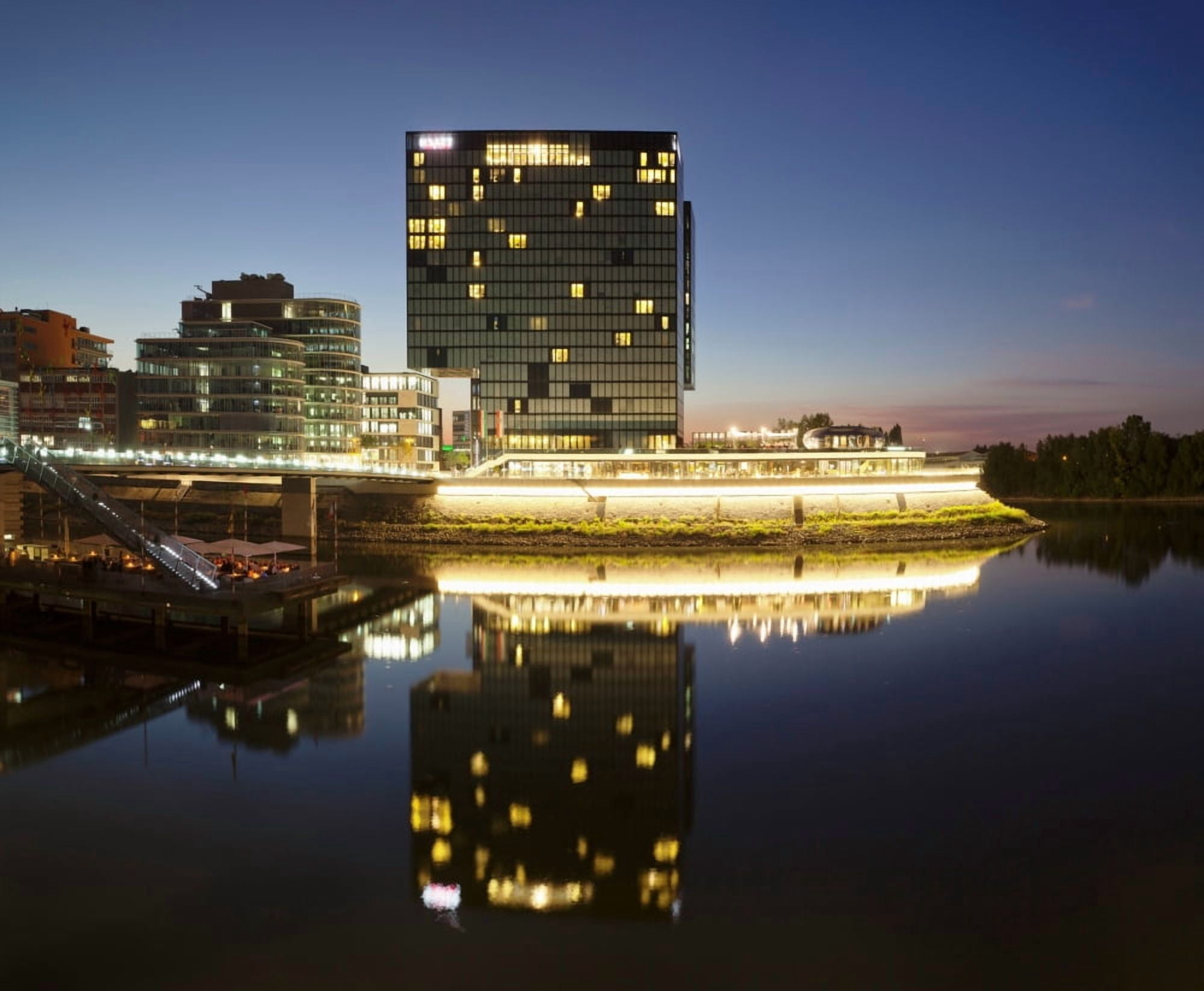 Hyatt Hotel at dusk Media Harbour Dusseldorf North Rhine Westphalia Germany Canvas Art - Panoramic Images (9 x 27)