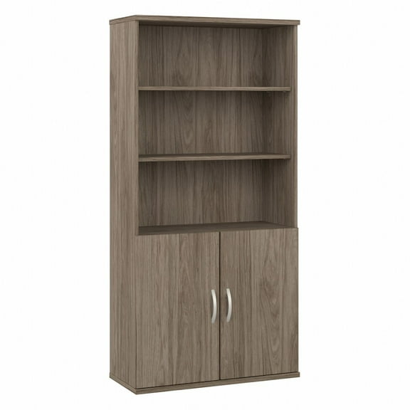 Hybrid Tall 5 Shelf Bookcase with Doors in Modern Hickory - Engineered Wood
