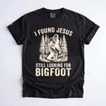 thumbnail image 1 of I Found Jesus Still Looking For Bigfoot Shirt, Funny Christian Sasquatch Tee, Retro Faith Humor Graphic T-Shirt, 1 of 4