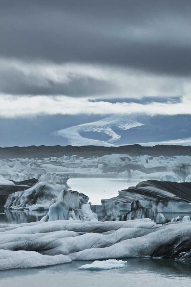 Ice Formations On The Rock In The Water Jokulsarlon Iceland Canvas Art - David DuChemin  Design Pics (24 x 38)