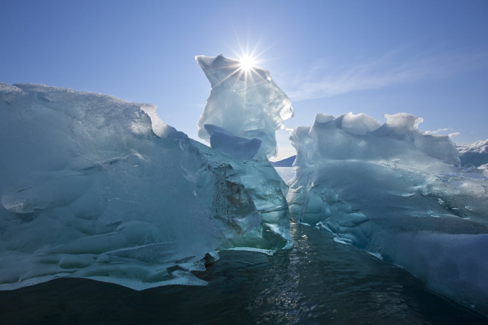 An Iceberg Floating On The Calm Waters Of Holkham Bay At The Entrance To Tracy Arm Southeast Alaska Autumn Canvas Art - John Hyde  Design Pics (19 x 12)