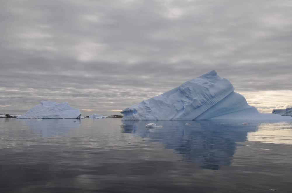 Iceberg reflection Antarctica Canvas Art - Mathieu MeurStocktrek Images (18 x 12)