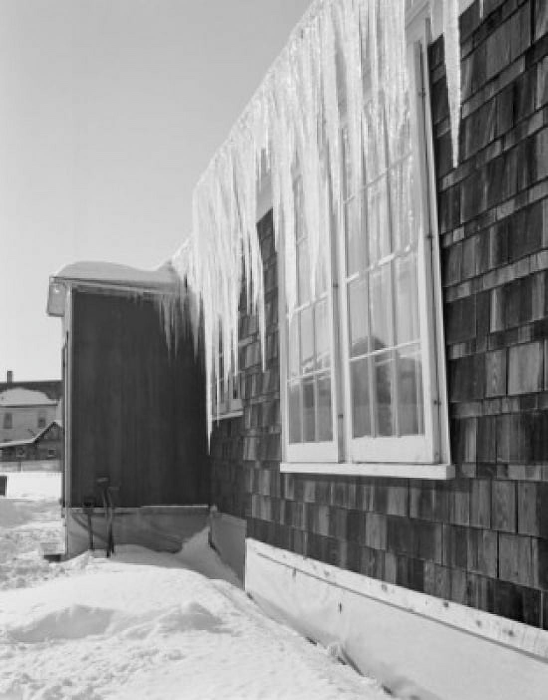 Icicles hanging from side of house Canvas Art - (18 x 24)