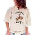 thumbnail image 1 of If It Ain't Broke Ride It T-Shirt, Funny Cowboy Riding Horse Graphic Tee, Western Themed Shirt, Vintage Rodeo Apparel, Gift for Him or Her, Ivory Comfort Colors T-Shirt, 2XL, 1 of 1