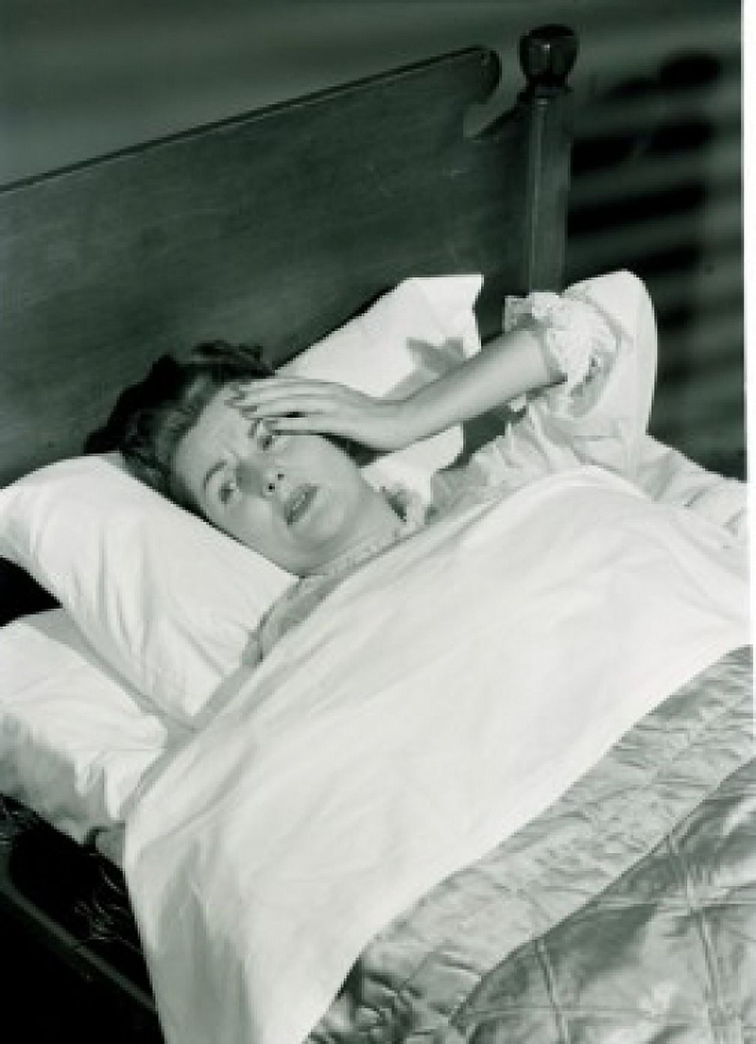 Ill woman lying in bed Canvas Art - (18 x 24)