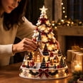thumbnail image 1 of Illuminated Christmas Town Tree Tabletop Ornament Lighted Village Scene with Church Snowmen Bows and Warm Built In Lights, 1 of 9