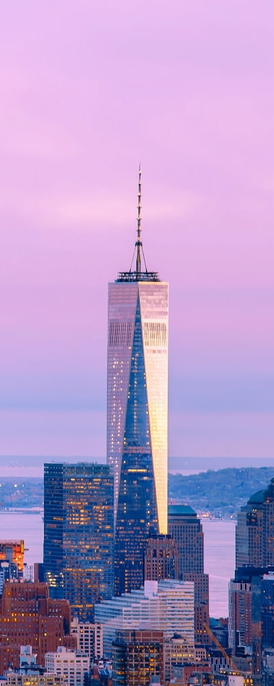 Illuminated One World Trade Center amidst buildings against sky in city at dusk Manhattan New York City New York State USA Canvas Art - Panoramic Images (12 x 30)