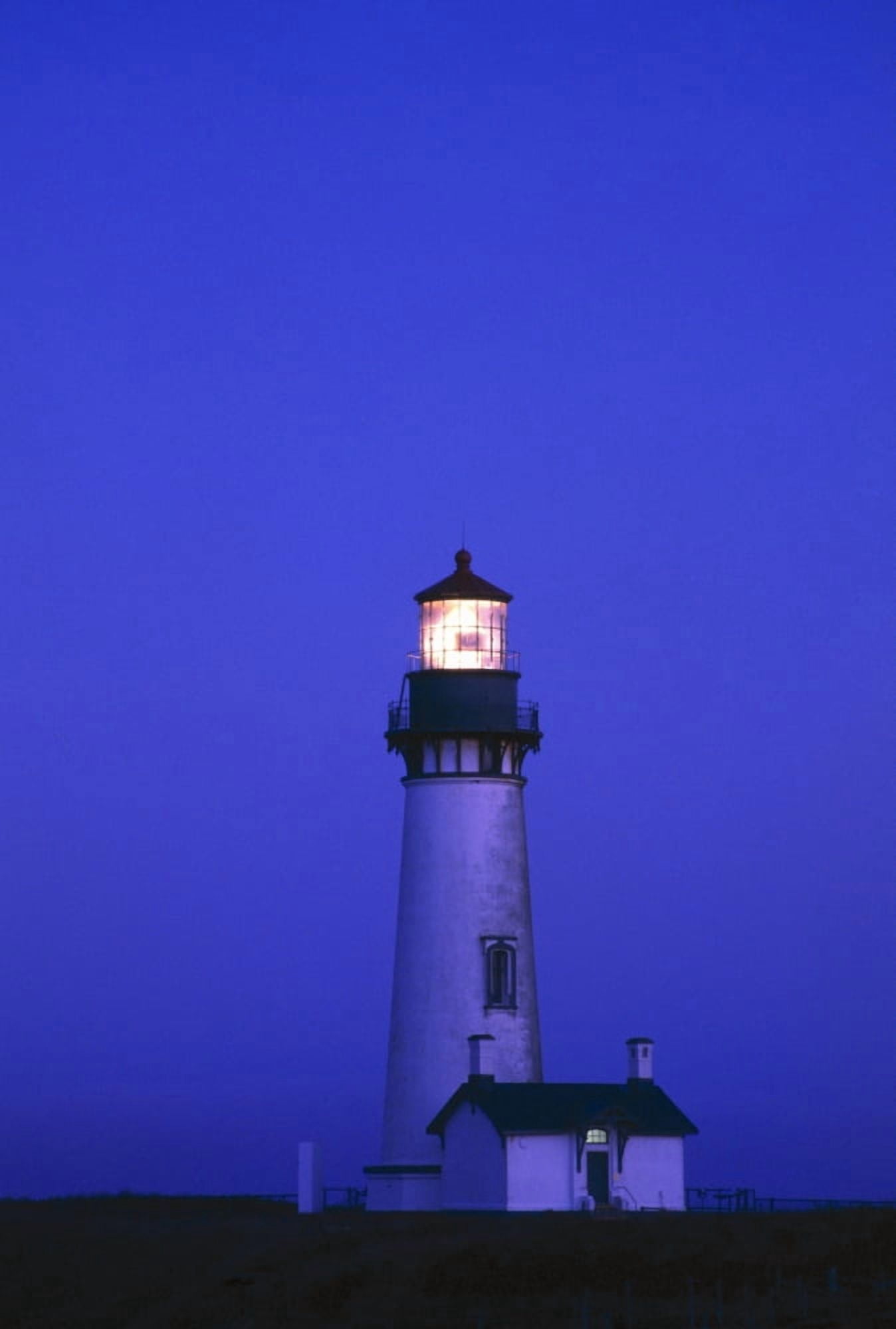 Illuminated Yaquina Head Lighthouse At Dawn Canvas Art - Natural Selection Craig Tuttle Design Pics (12 x 18)